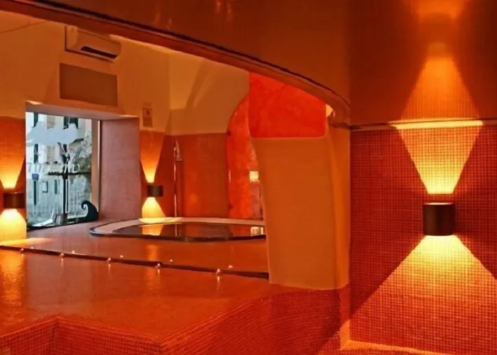 לינה וארוחת בוקר I Tre Merli 4*